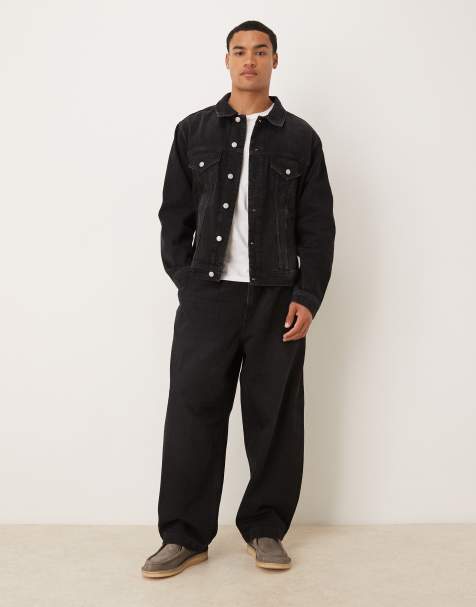 ASOS DESIGN – Lockere, schmal zulaufende Jeans in Schwarz mit Faltendetail, Kombiteil - view 1