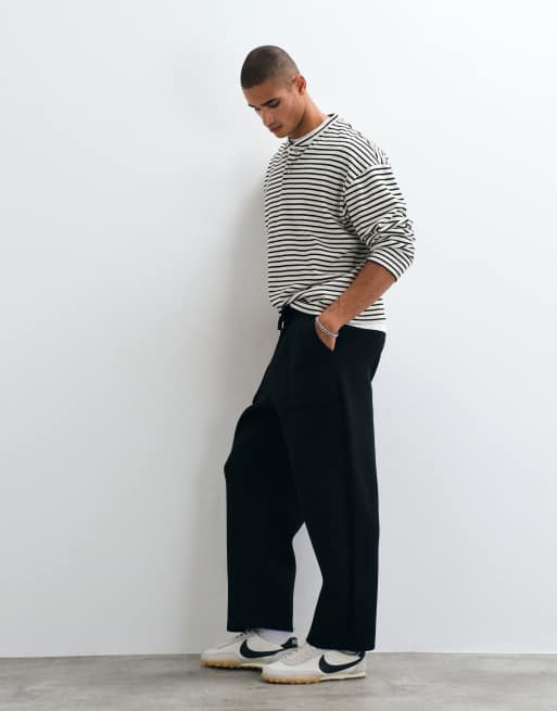 ASOS DESIGN lockere Tapered-Jogger aus Scuba-Stoff in Schwarz, 2 von 5