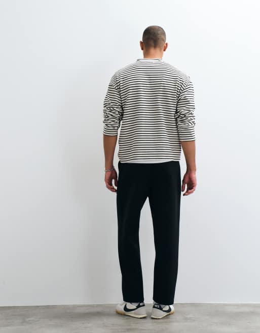 ASOS DESIGN lockere Tapered-Jogger aus Scuba-Stoff in Schwarz, 4 von 5