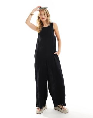 ASOS DESIGN - Lockerer Jumpsuit in Schwarz mit Hosenrock-Design und Rundhalsausschnitt