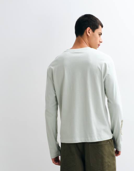 ASOS DESIGN lockeres Boxy-T-Shirt mit langen Ärmeln und Grafik in Hellgrün, 4 von 5