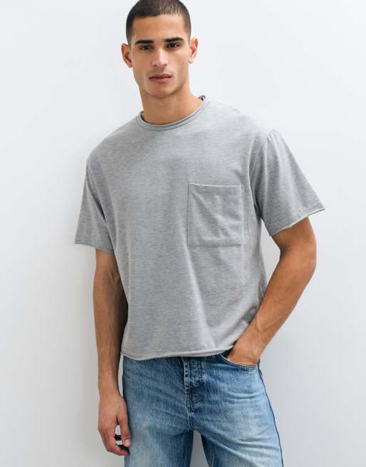 ASOS DESIGN lockeres Boxy-T-Shirt mit Tasche und offenen Säumen in Graumeliert, 2 von 5