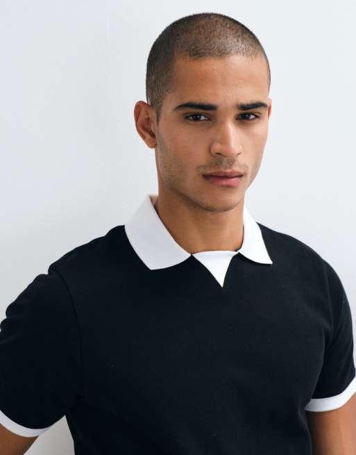 ASOS DESIGN lockeres Polohemd mit Kontrastfarbe in schwarzem Piqué, 3 von 5