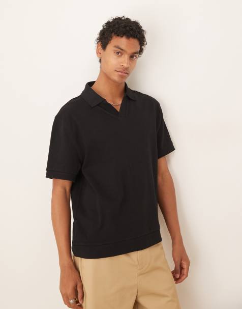 ASOS DESIGN – Lockeres Premium-Poloshirt in Schwarz mit einem Gewicht von 300 g/m² - view 1