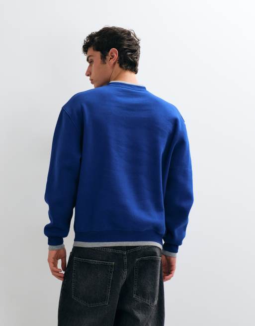 ASOS DESIGN lockeres Sweatshirt mit Rundhalsausschnitt und angesetzten Rippen in Blau aus Poly-Baumwolle, 3 von 5