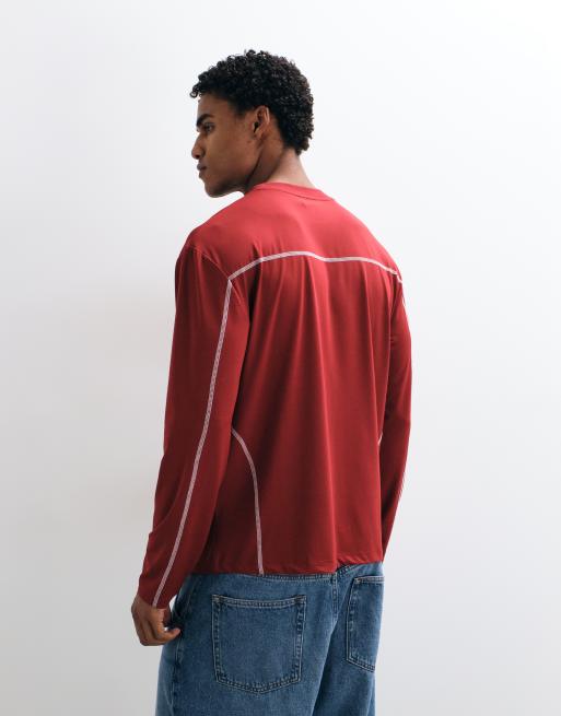 ASOS DESIGN lockeres T-Shirt mit langen Ärmeln, Flatlock-Nahtdetail und Textgrafik in Rot, 3 von 5