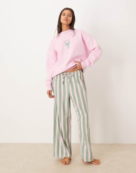 ASOS DESIGN logo jersey sweatshirt pajama set with woven pants in pink and green stripe - view 1