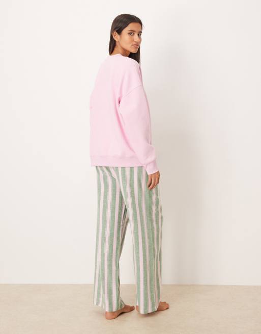 ASOS DESIGN logo jersey sweatshirt pyjama set with woven stripe trouser in pink and green stripe, 3 of 4