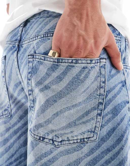 ASOS DESIGN long length denim jort with zebra laser print and tint in mid wash blue, 3 of 5