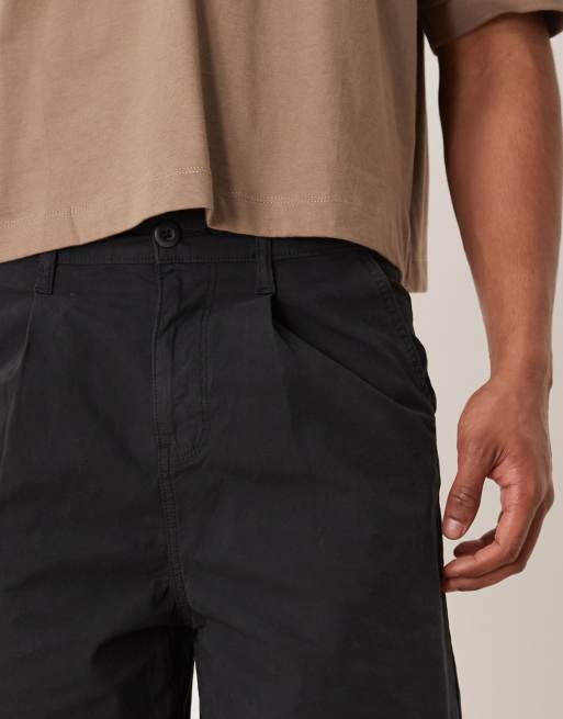 ASOS DESIGN long length pleated shorts in black