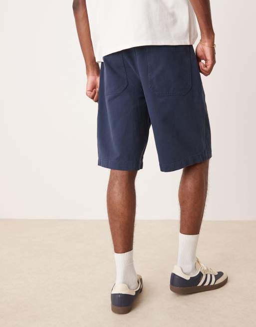 ASOS DESIGN long length pleated shorts in navy