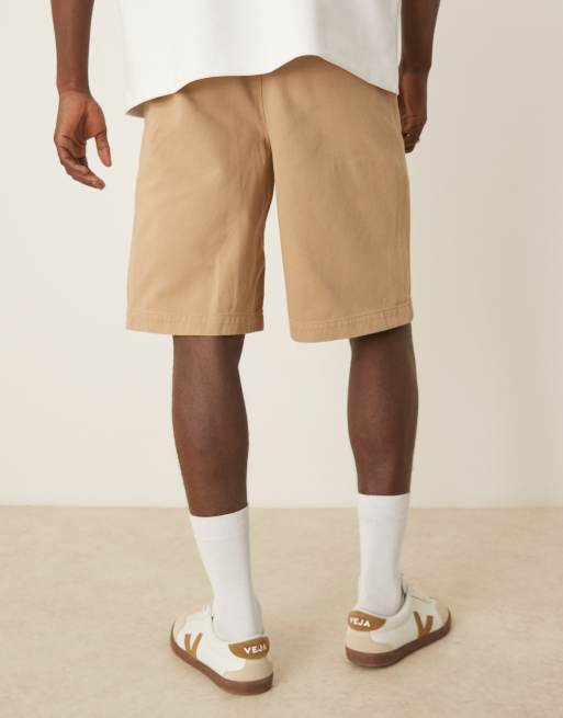 ASOS DESIGN long length pleated shorts with double darts in beige