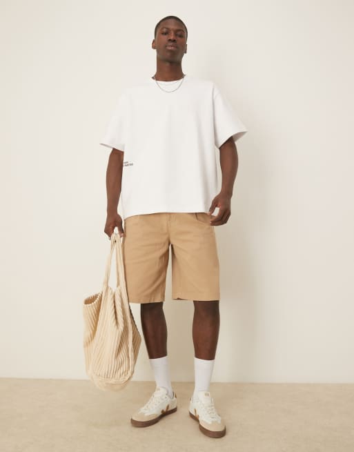 ASOS DESIGN long length pleated shorts with double darts in beige