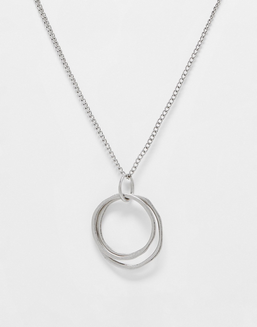 ASOS DESIGN long pendant necklace with large circular pendant in silver tone