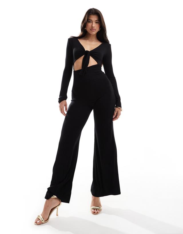 ASOS DESIGN - long sleeve asymmetric cut out jumpsuit with tie back in black