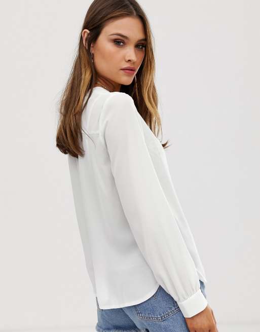 ASOS DESIGN long sleeve blouse with pocket detail in Ivory