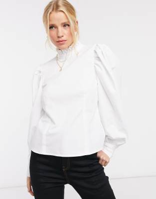 white blouse with ruffle neck