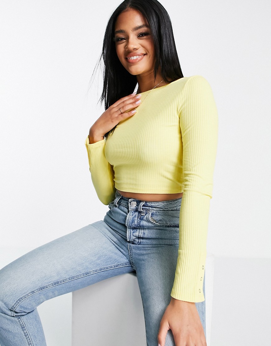 ASOS DESIGN long sleeve crop top with snap cuff in lemon-Yellow
