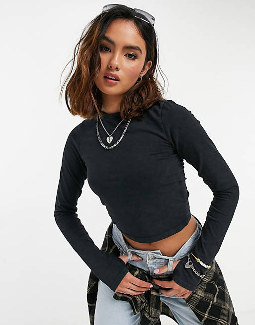 ASOS DESIGN long sleeve crop top with thumb hole in washed black | ASOS