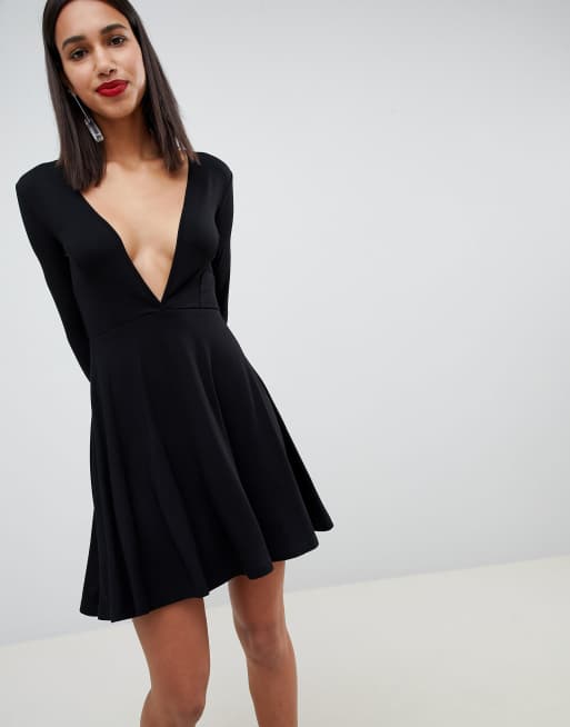 Long sleeve on sale low cut dress