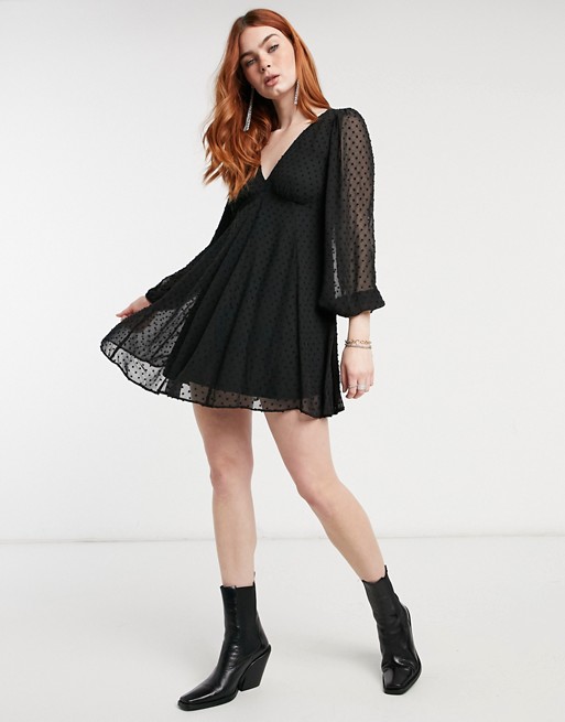 ASOS DESIGN long sleeve dobby mini dress with godets and lace up back in black