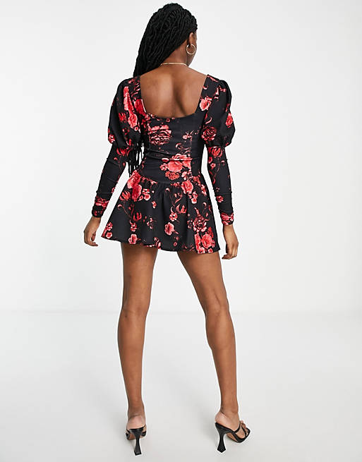 Women long sleeve flippy mini dress with ruched bust in red floral print 