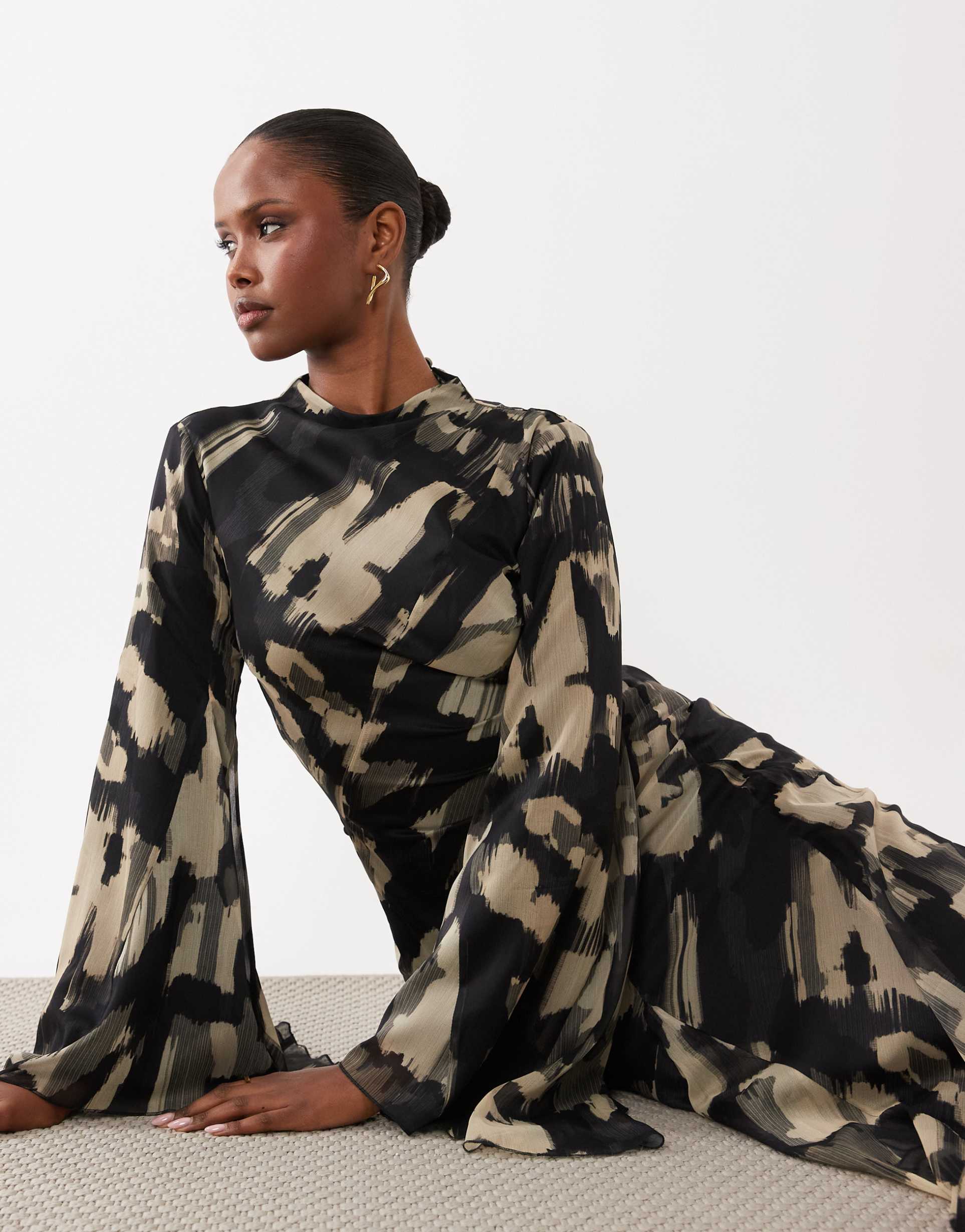 asos design long sleeve high neck maxi dress with ruffle godets and flute sleeves in mono abstract print