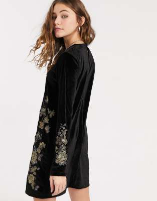 black dress with gold embroidery