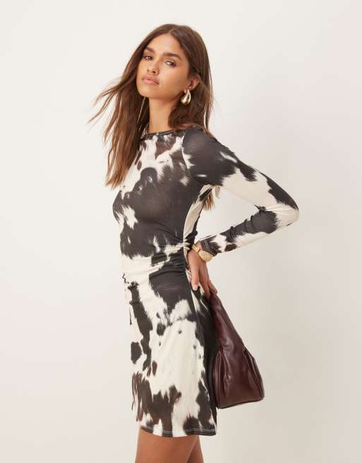 ASOS DESIGN long sleeve mini dress in cow print ASOS