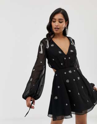 asos design long sleeve mini dress in floral print with cluster embellishment detail and circle trims