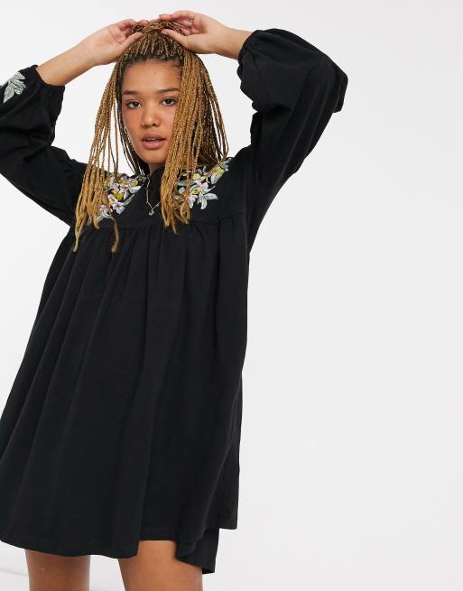 ASOS DESIGN long sleeve mini smock dress in black with yellow floral  embroidery on shoulder and cuffs