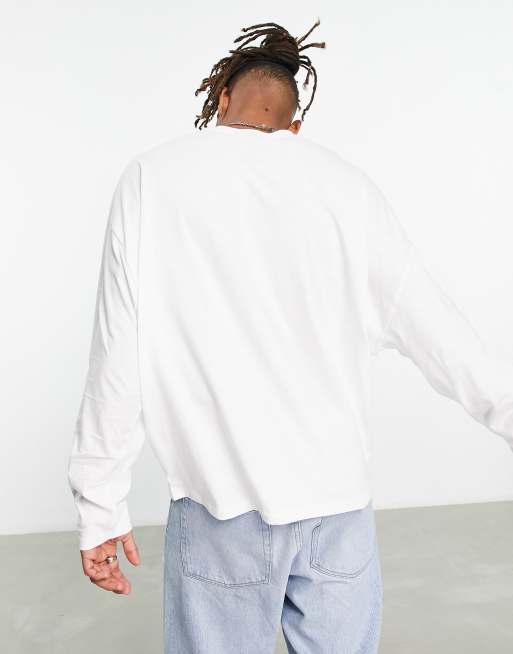 ASOS DESIGN long sleeve oversized t-shirt in white with skate