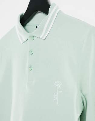 pastel green polo shirt