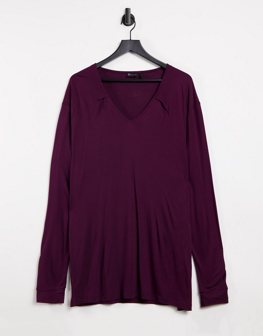 ASOS DESIGN long sleeve relaxed viscose t shirt with deep v neck in burgundy-Red