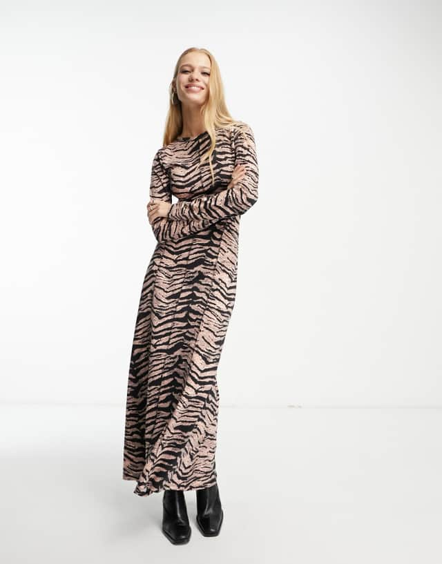 ASOS DESIGN long sleeve rib midi dress with contrast stitch detail in animal print