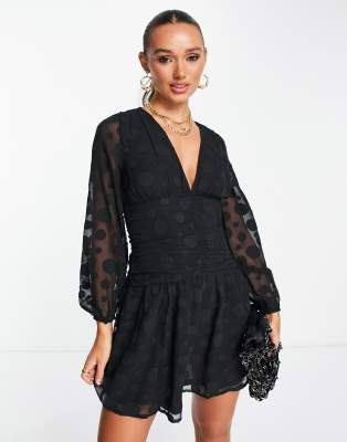 ASOS DESIGN long sleeve ruched front skater mini dress in black spot jacquard