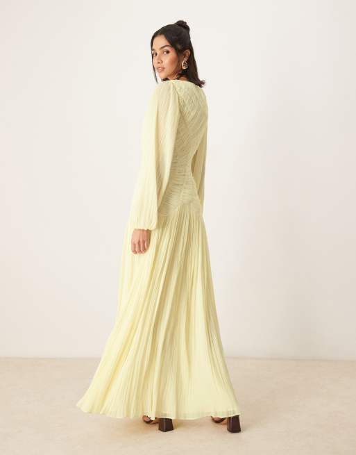ASOS DESIGN long sleeve shirred crinkle maxi dress with drop waist in lemon yellow