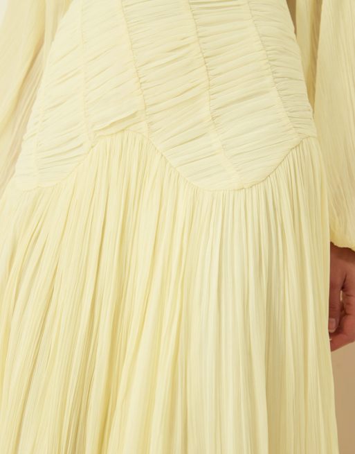 ASOS DESIGN long sleeve shirred crinkle maxi dress with drop waist in lemon yellow