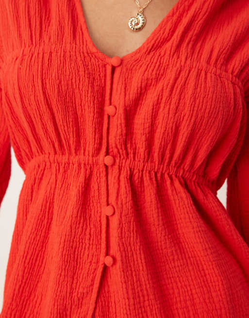 ASOS DESIGN long sleeve smock top with button front in red