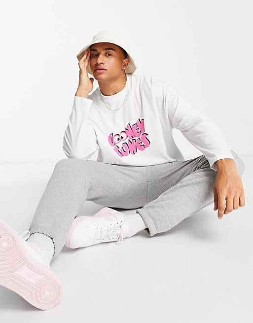 ASOS DESIGN long sleeve t-shirt with Looney Tunes prints in white | ASOS