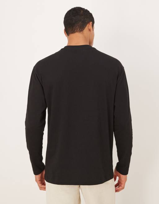 ASOS DESIGN long sleeve t-shirt with small flower chest print in black, 3 of 5