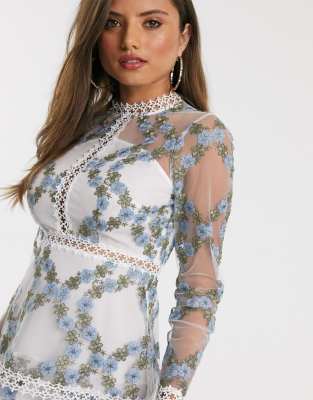 white dress with blue design