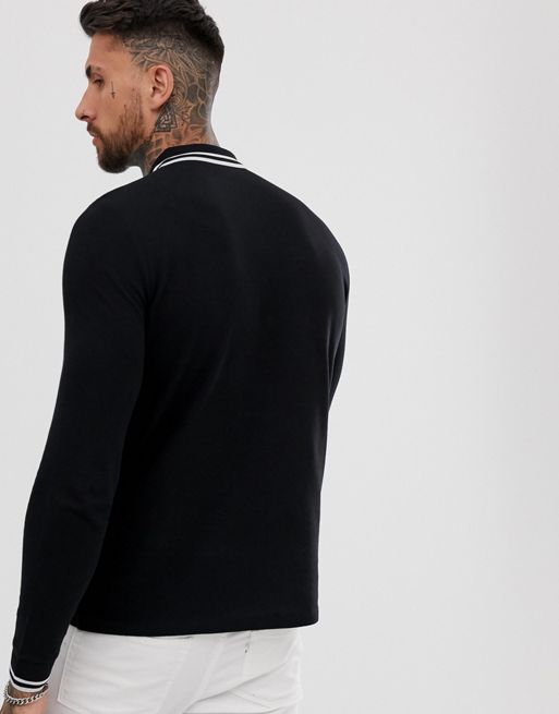Stussy Heavy Pique Long Sleeve Polo Shirt With Logo Collar, $84, Asos