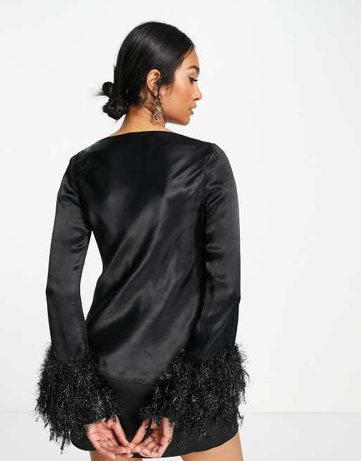 black feather blouse