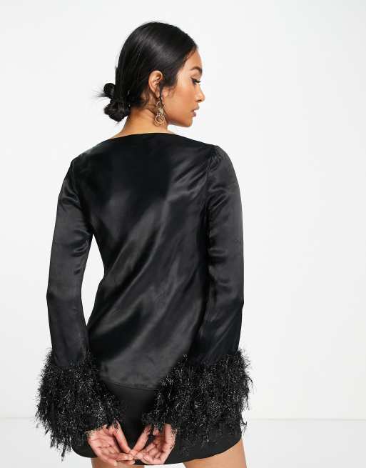 ASOS DESIGN long sleeve top with faux feather cuff detail in black