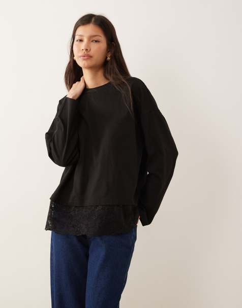 ASOS DESIGN long sleeve top with lace-trim hem detail in black - view 1