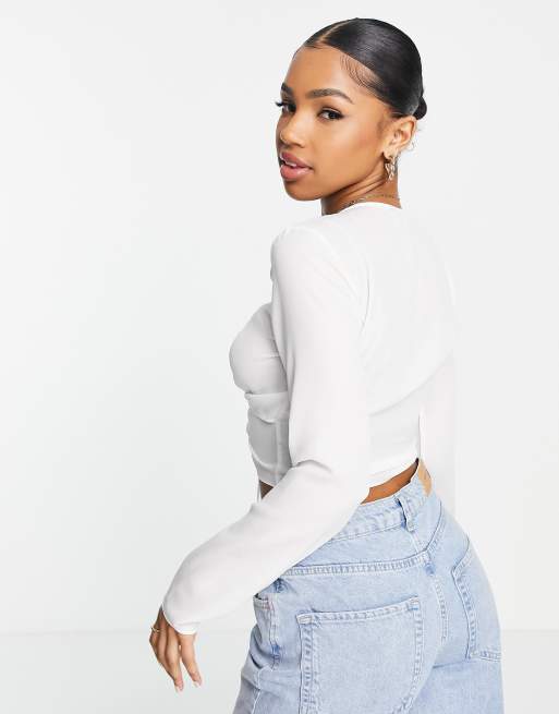 ASOS DESIGN long sleeve fitted crop top with ruched sides in white