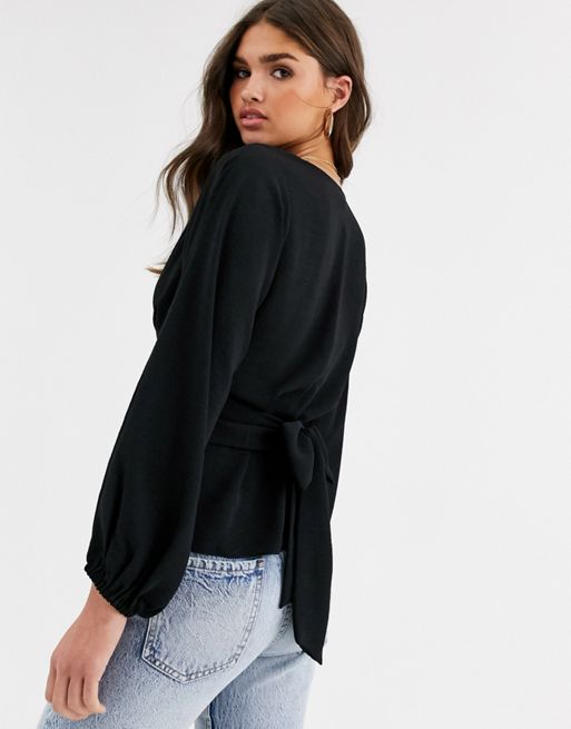 ASOS DESIGN long sleeve top with twist neck detail in ivory