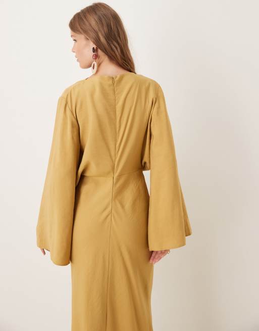 ASOS DESIGN long sleeve tucked waist bias cut maxi dress in gold