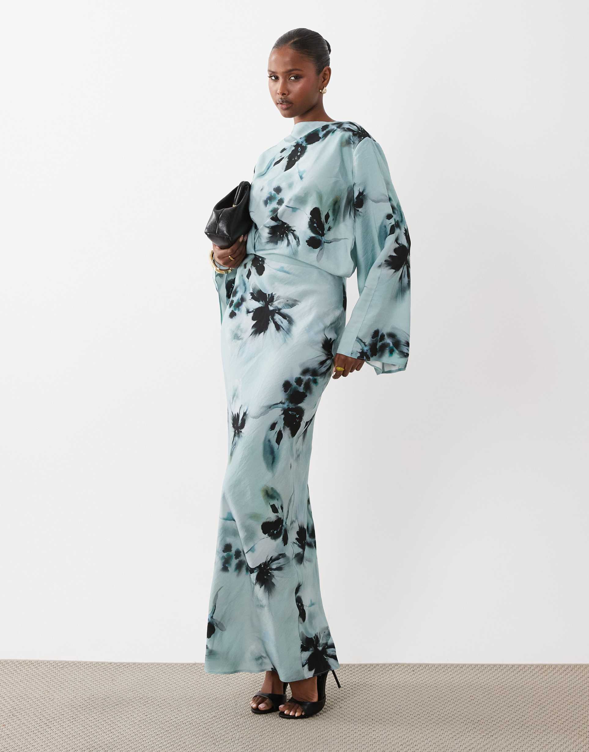 asos design long sleeve tucked waist bias maxi dress in blue blurred floral print